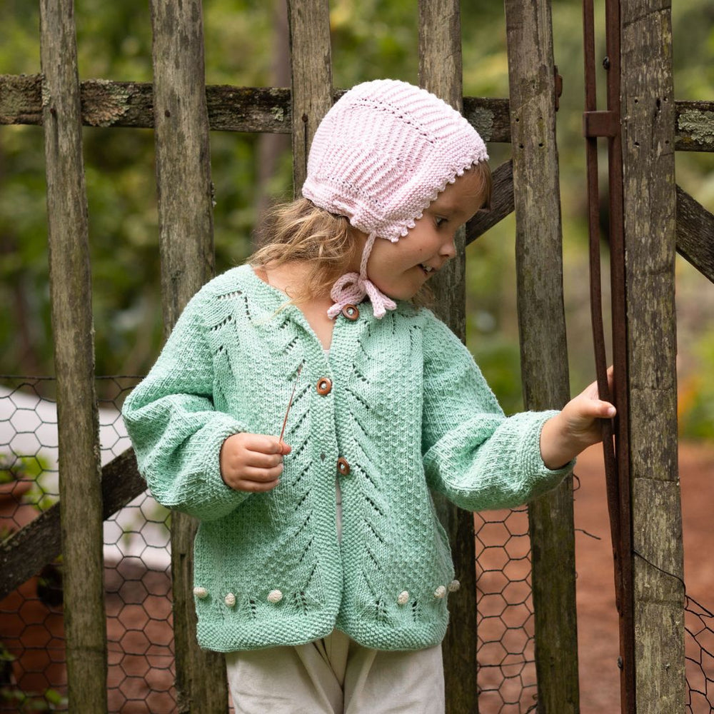 Layla Cardigan — handmade lace knit and popcorn detail cotton bamboo cardigan for girls by JuneBee Baby in green and cream.