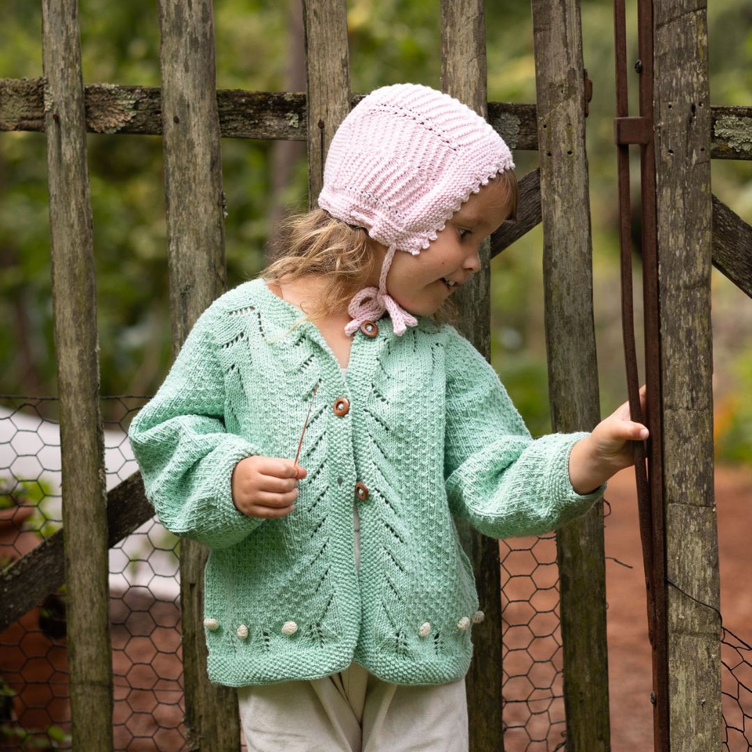 Layla Cardigan — handmade lace knit and popcorn detail cotton bamboo cardigan for girls by JuneBee Baby in green and cream.