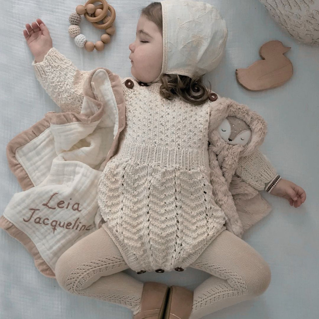 Hand-knit children's romper in soft cotton and bamboo yarn, artisan made by JuneBee Baby