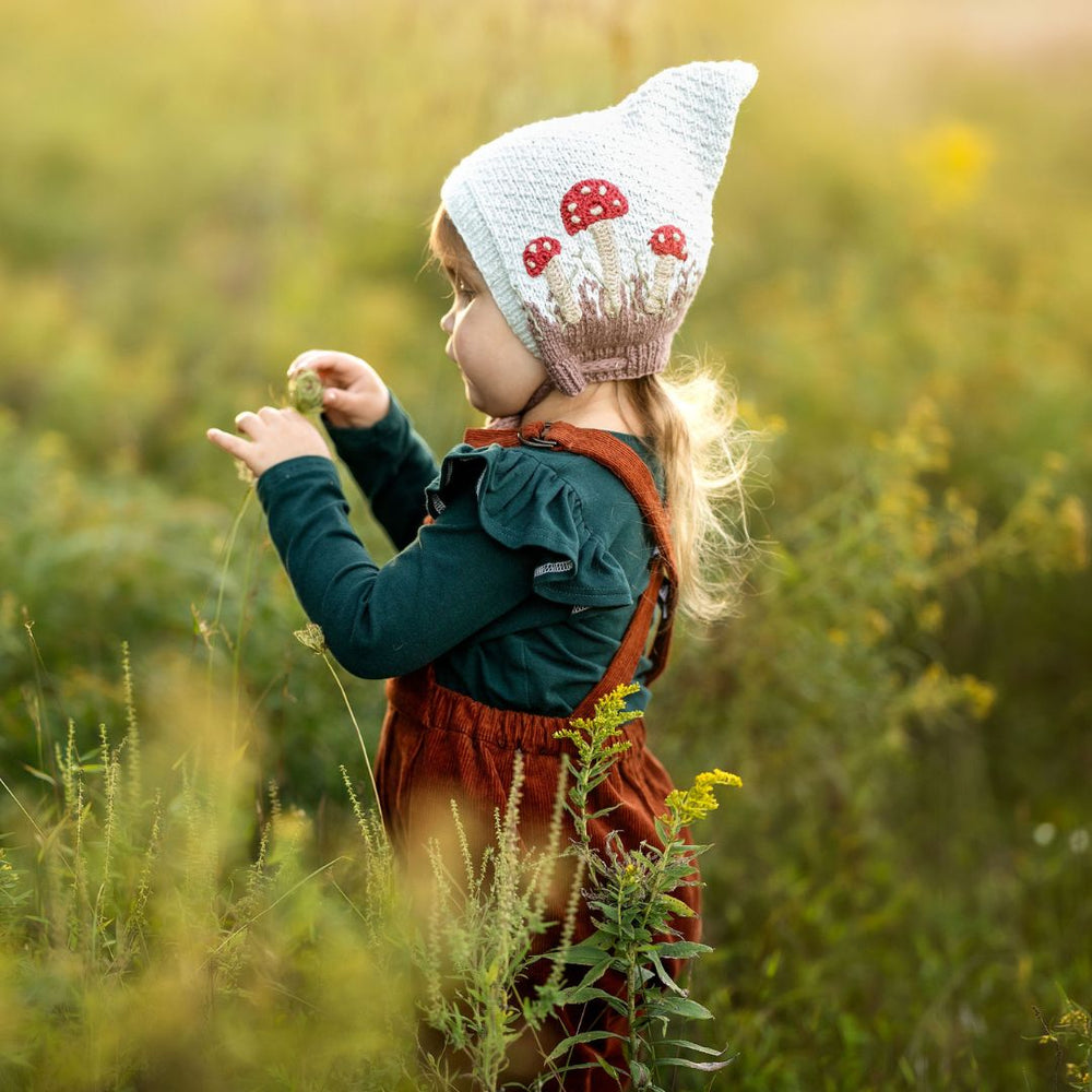 Gender-neutral mushroom pixie hat hand-knit in cotton bamboo — artisan-made, slow fashion knitwear for babies and kids by JuneBee Baby.