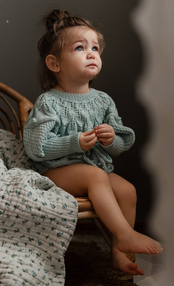 Hand knitted Shirley Romper for girls.