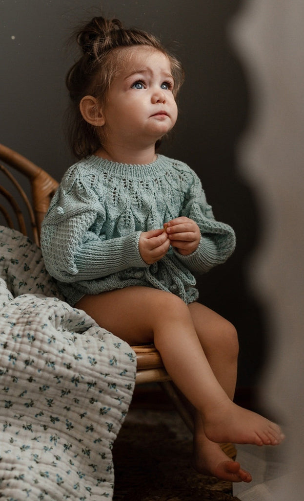 Hand knitted Shirley Romper for girls.