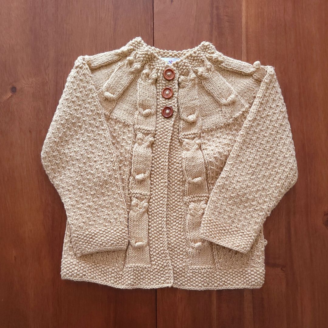 Handmade baby owl cardigan in honey beige - vintage style popcorn knit by JuneBee Baby artisan clothing shop
