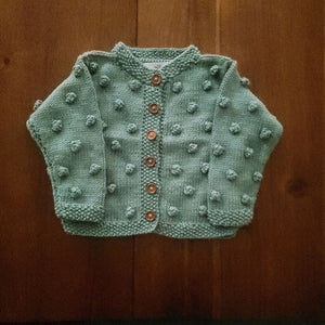 Handmade popcorn knit baby cardigan in sage green - Carrie by JuneBee Baby
