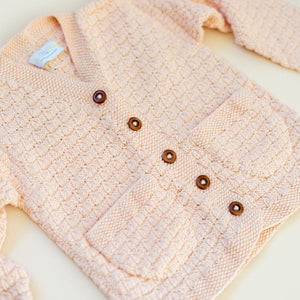 Hand-knit cotton bamboo cable cardigan in Light Peach – made-to-order baby & kids knitwear
