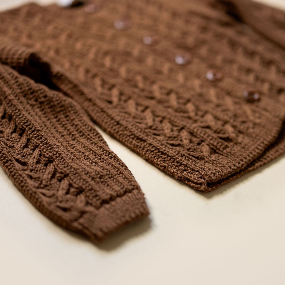 Close-up of Aspen Cardigan knit texture, handmade kids knitwear by JuneBee Baby