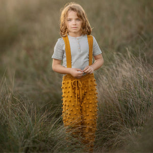 Henley Suspender Pants in Mustard - hand-knit popcorn stitch baby pants by JuneBee Baby
