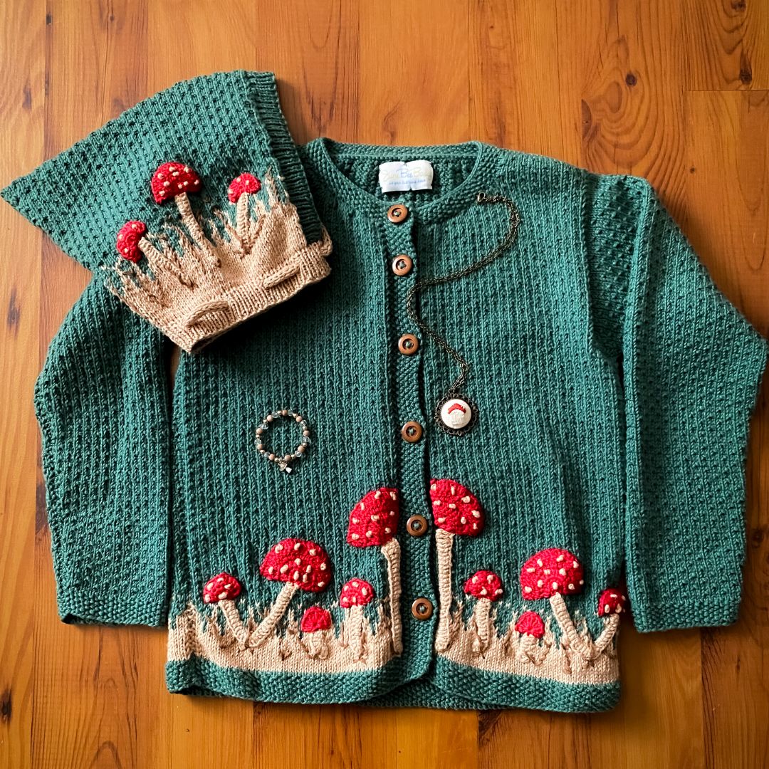 Hand-knit mushroom cardigan in hunter green cotton bamboo, artisan-made kids knitwear.