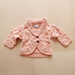 Handmade popcorn stitch shawl collar baby cardigan in peach - Bella by JuneBee Baby
